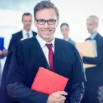 Portrait of lawyer holding law book