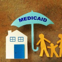 Umbrella that reads Medicaid’