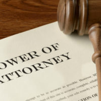 A document that reads power of attorney