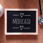 Chalkboard that reads medicaid