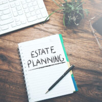 Text estate  planning  on  notepad