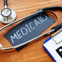 Medicaid is shown on the conceptual business photo
