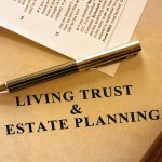 Living trust and estate planning document. A tax form is also included in the scene.