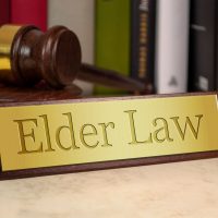 Golden sign with gavel and elder law