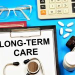 Long-term care. A text label in the planning folder. A health care payment program that ensures well-being.